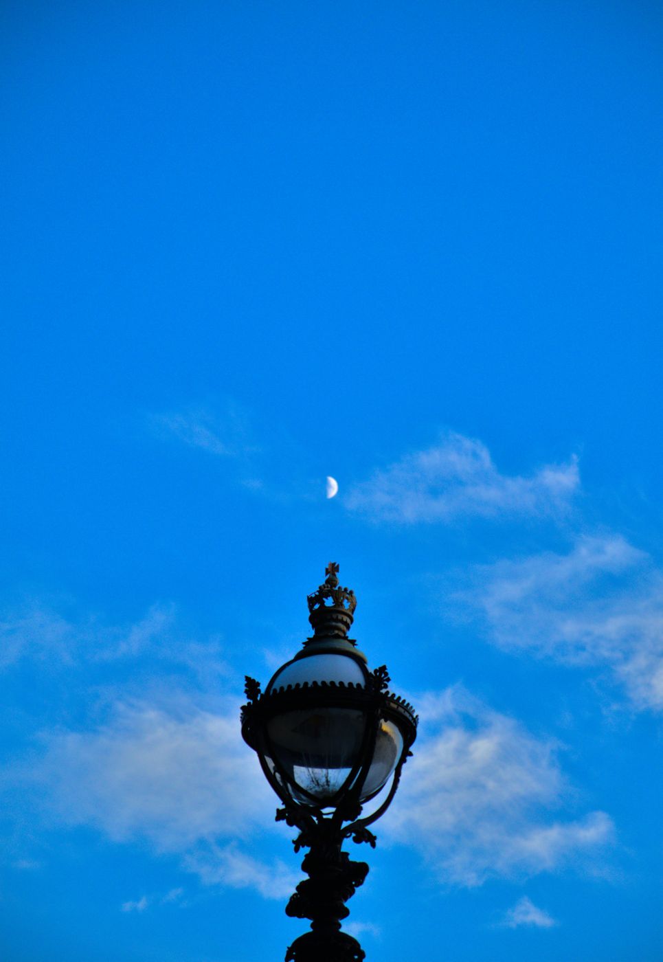 Lamp and a daytime moon